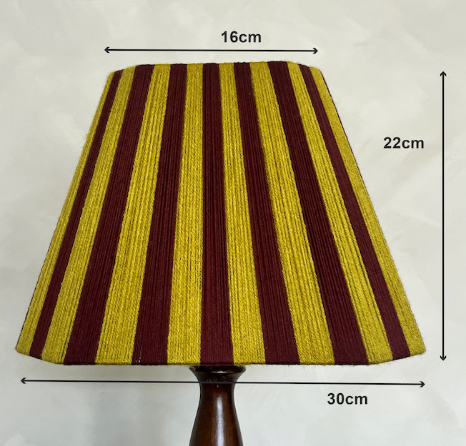 A Slice Shades yarn lampshade with alternating vertical stripes of mustard yellow and dark burgundy, shown with dimension call outs indicating 16cm width, 22cm height, and 30cm total shade-to-base width.