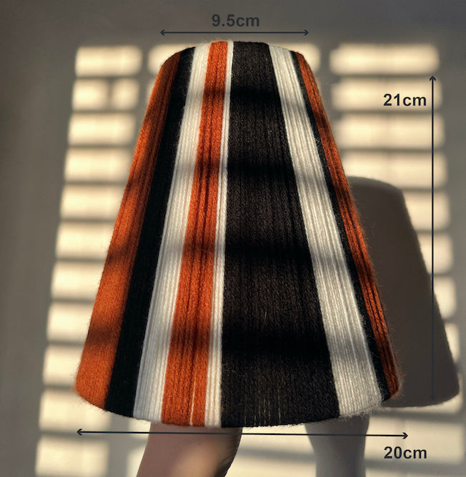 A Slice Shades lampshade with vertical stripes in rust orange, black, and white, shown with dimension overlays indicating a height of 21cm, width of 20cm, and top diameter of 9.5cm.