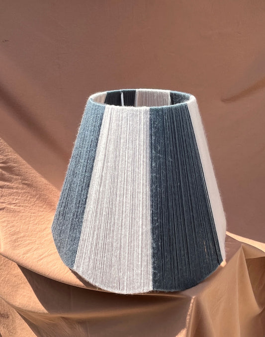 A Slice Shades scallop yarn lampshade in the sunlight